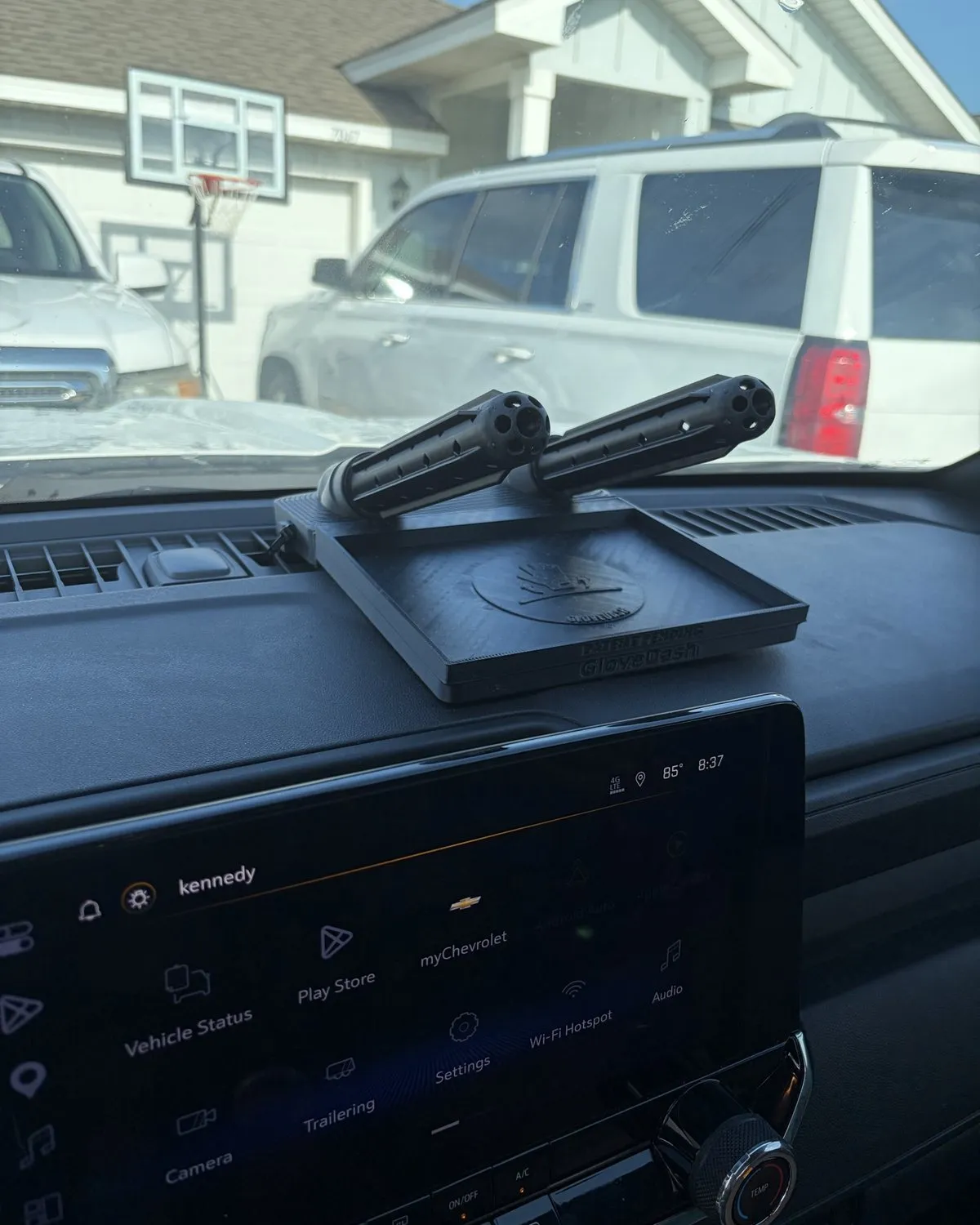 Black GloveDash mounted on a customer's Chevrolet dashboard